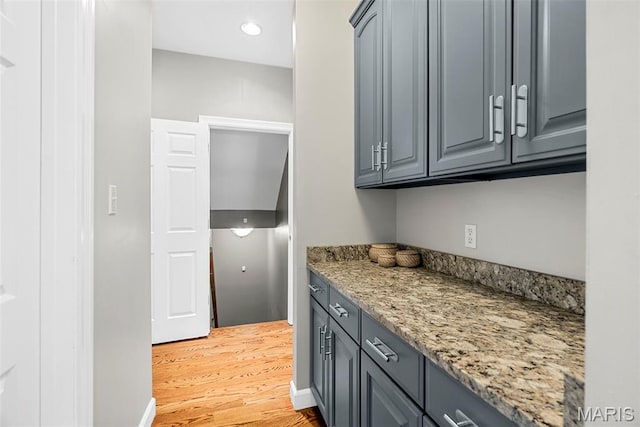 1424 Haarman Oak Dr, Wildwood, MO 63005 - laundry area with light wood finished floors and recessed lighting