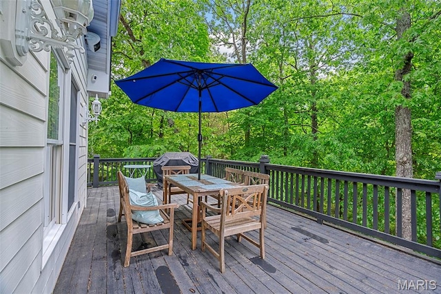 1424 Haarman Oak Dr, Wildwood, MO 63005 - wooden deck featuring outdoor dining space and area for grilling