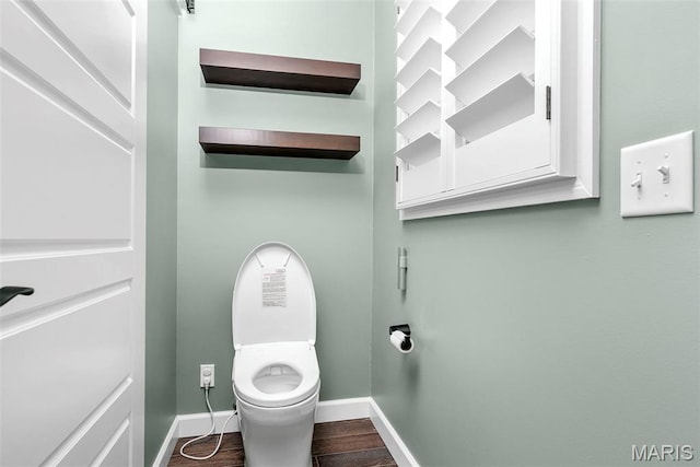 1424 Haarman Oak Dr, Wildwood, MO 63005 - bathroom with baseboards, toilet, and wood finished floors