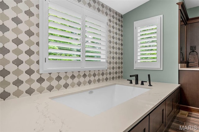 1424 Haarman Oak Dr, Wildwood, MO 63005 - bathroom featuring wallpapered walls and wood finished floors