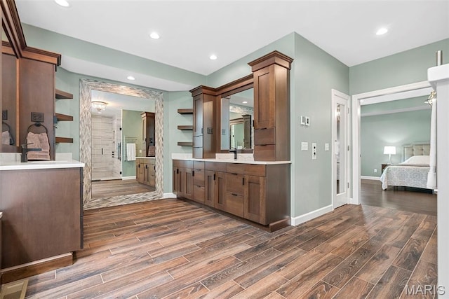 1424 Haarman Oak Dr, Wildwood, MO 63005 - ensuite bathroom with wood finished floors, baseboards, vanity, a shower stall, and recessed lighting
