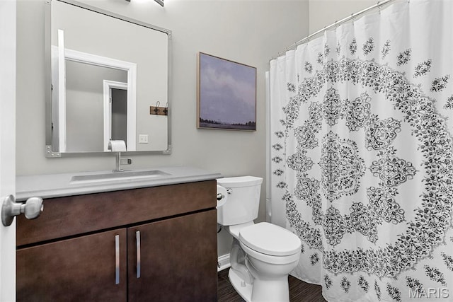 1424 Haarman Oak Dr, Wildwood, MO 63005 - full bath featuring toilet, vanity, a shower with shower curtain, and wood finished floors