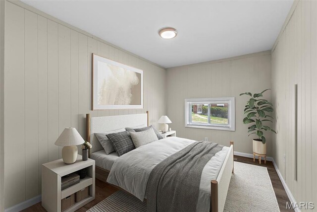4717 Roxie St, Saint Louis, MO 63121 - bedroom with dark wood-style floors and baseboards