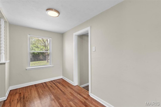 4717 Roxie St, Saint Louis, MO 63121 - empty room with wood finished floors and baseboards