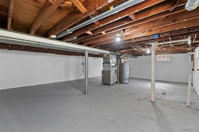 4717 Roxie St, Saint Louis, MO 63121 - basement featuring heating unit and gas water heater