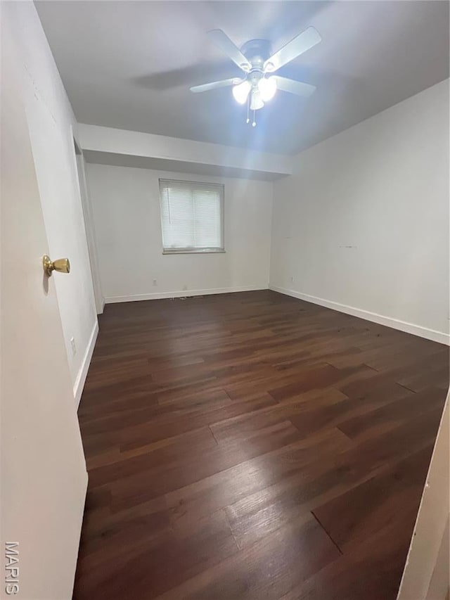6145 Payne Ave, Saint Louis, MO 63135 - spare room with a ceiling fan, wood finished floors, and baseboards