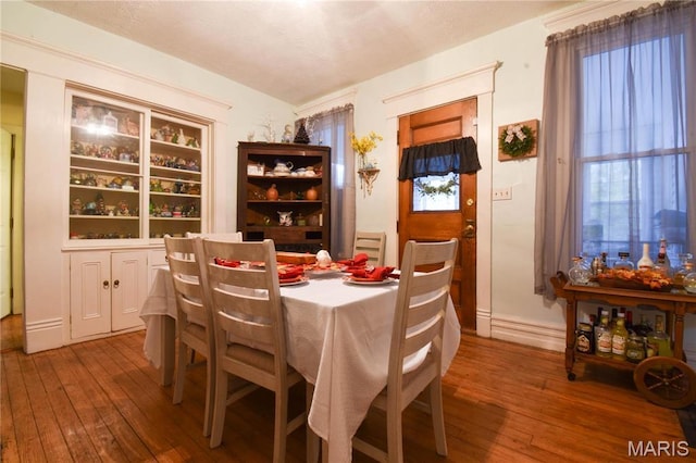 120 E Corbin St, Bethalto, IL 62010 - dining room featuring hardwood / wood-style floors and baseboards