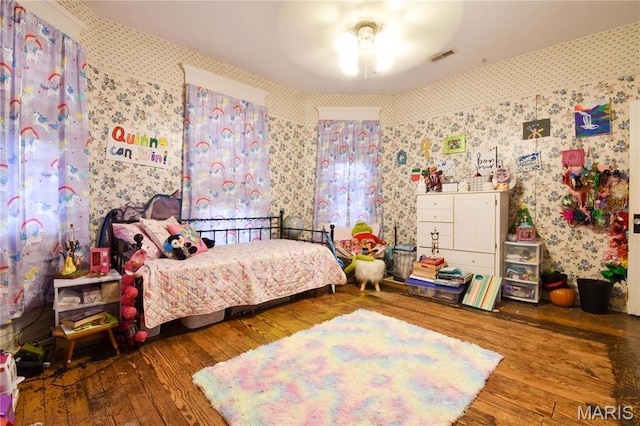120 E Corbin St, Bethalto, IL 62010 - bedroom featuring hardwood / wood-style flooring and wallpapered walls