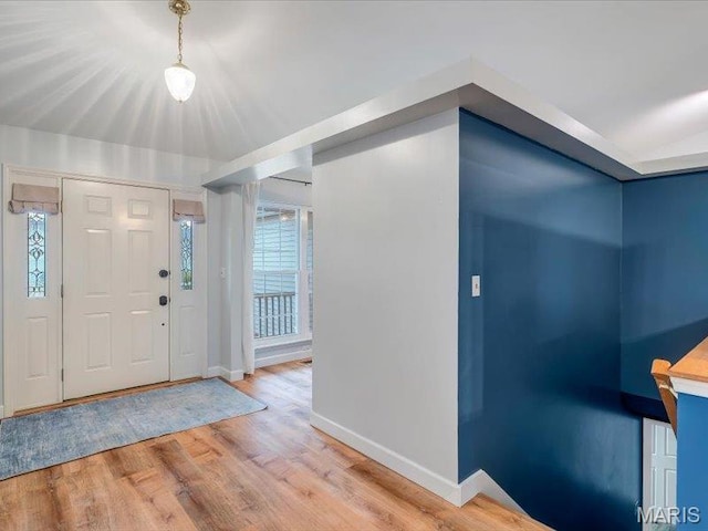927 Annabrook Park Dr, Ofallon, MO 63366 - foyer entrance featuring baseboards and wood finished floors
