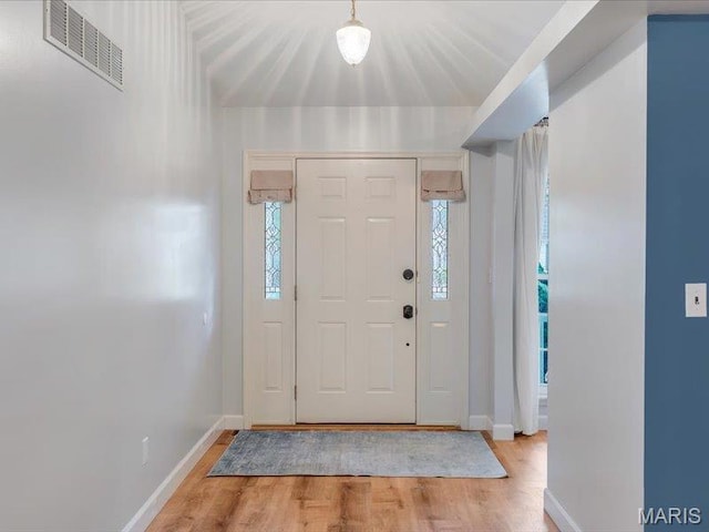 927 Annabrook Park Dr, Ofallon, MO 63366 - foyer featuring wood finished floors, healthy amount of natural light, and baseboards