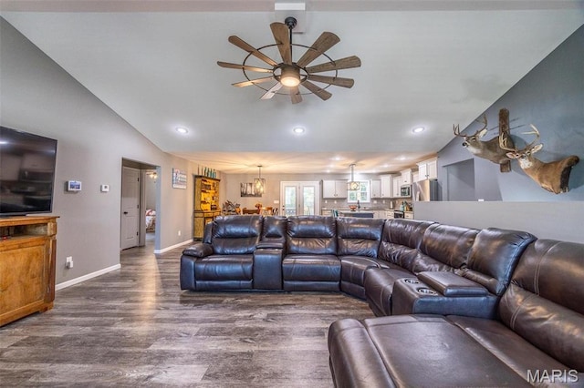 1541 Fairfield Dr, Lebanon, MO 65536 - living room with ceiling fan, dark wood-type flooring, baseboards, recessed lighting, and a chandelier