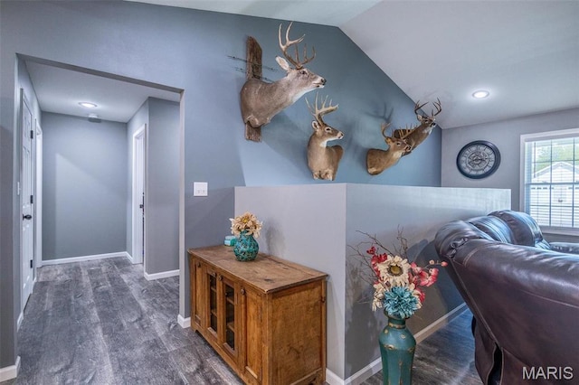 1541 Fairfield Dr, Lebanon, MO 65536 - hallway with wood finished floors, vaulted ceiling, and baseboards