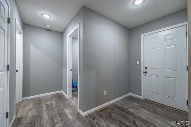 1541 Fairfield Dr, Lebanon, MO 65536 - foyer with wood finished floors, baseboards, and recessed lighting