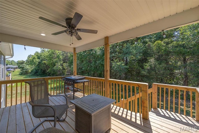 1541 Fairfield Dr, Lebanon, MO 65536 - wooden terrace with ceiling fan and view of scattered trees