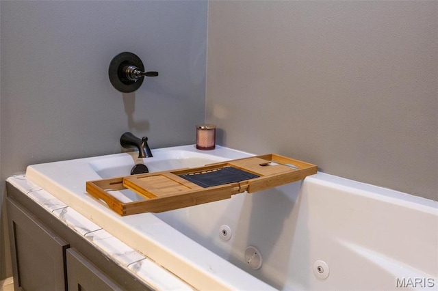 1541 Fairfield Dr, Lebanon, MO 65536 - bathroom view of a whirlpool tub and a sink
