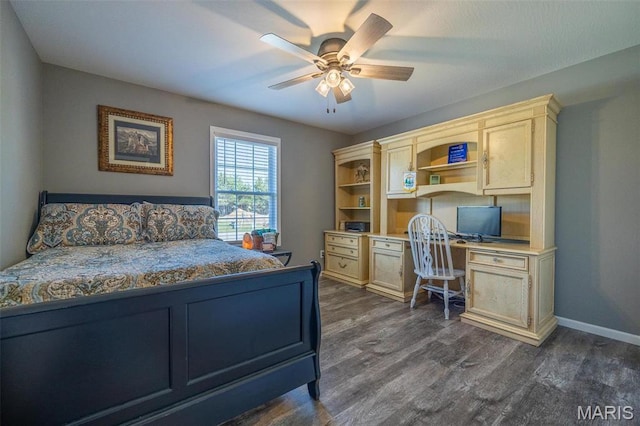 1541 Fairfield Dr, Lebanon, MO 65536 - bedroom featuring dark wood-style floors, baseboards, and a ceiling fan