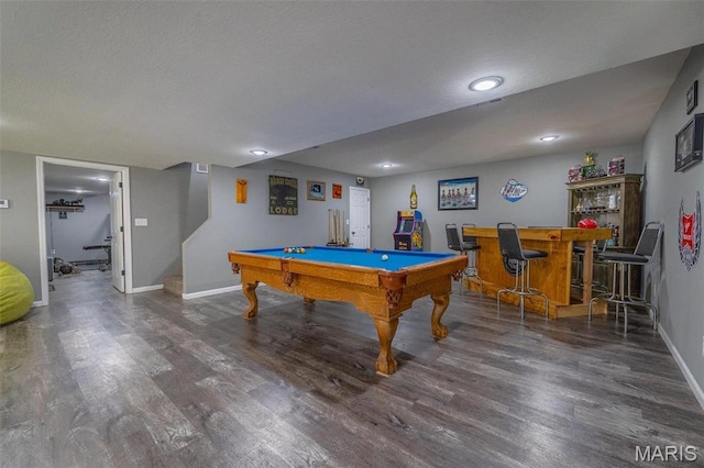 1541 Fairfield Dr, Lebanon, MO 65536 - recreation room with a bar, wood finished floors, baseboards, pool table, and a textured ceiling