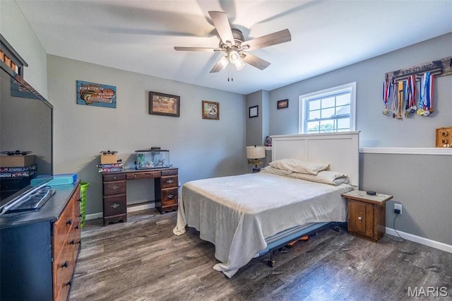 1541 Fairfield Dr, Lebanon, MO 65536 - bedroom with wood finished floors, baseboards, and ceiling fan