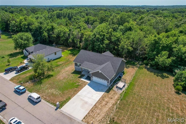 1541 Fairfield Dr, Lebanon, MO 65536 - view of subject property with a heavily wooded area