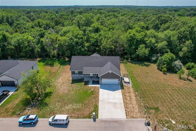 1541 Fairfield Dr, Lebanon, MO 65536 - view of subject property with a heavily wooded area