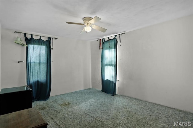11 Wilshire St, East Alton, IL 62024 - carpeted spare room with plenty of natural light and a ceiling fan