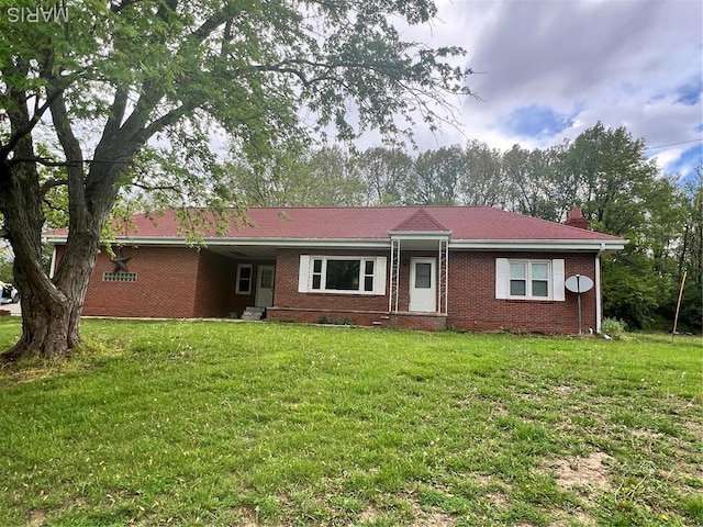 5007 Seiler Rd, Dorsey, IL 62021 - back of house featuring a yard and brick siding