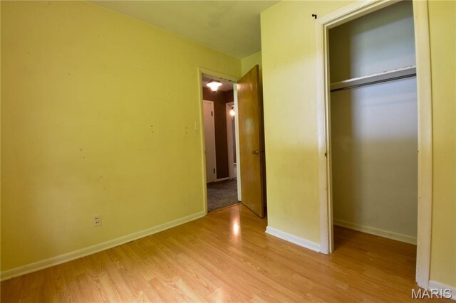 5007 Seiler Rd, Dorsey, IL 62021 - unfurnished bedroom featuring light wood finished floors, a closet, and baseboards