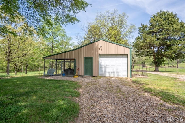 16785 County Road 624, Dexter, MO 63841 - garage featuring a detached garage and driveway