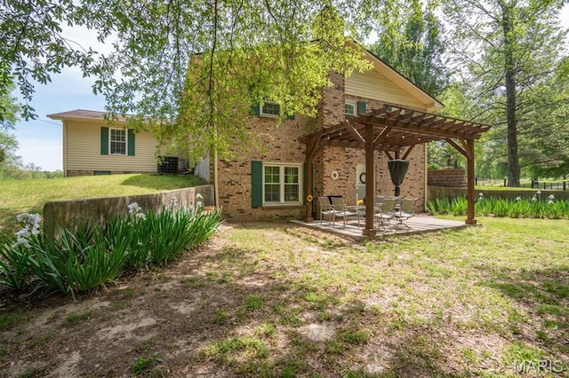 16785 County Road 624, Dexter, MO 63841 - rear view of house with a pergola, a patio area, brick siding, a lawn, and central AC