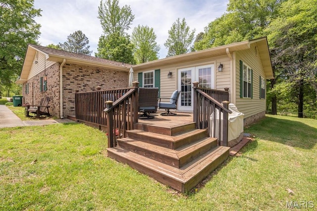 16785 County Road 624, Dexter, MO 63841 - rear view of property featuring a wooden deck and a lawn