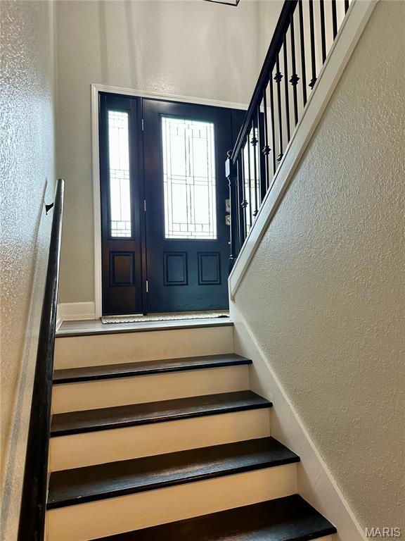 1324 Chelsea Ln, Rolla, MO 65401 - staircase with a textured wall