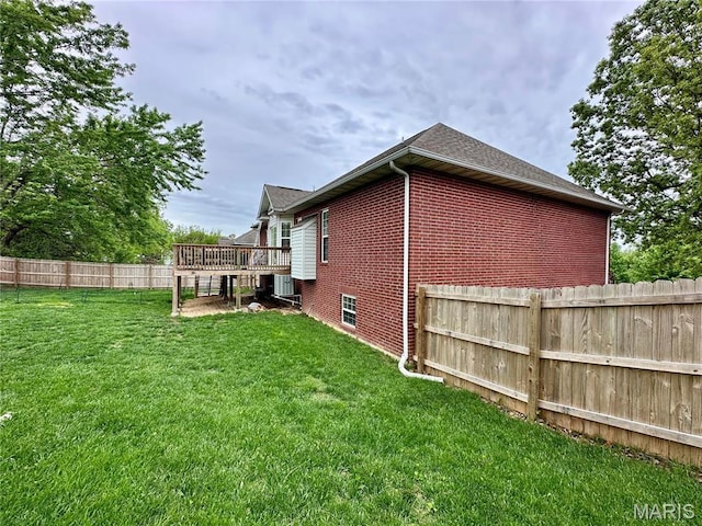 1324 Chelsea Ln, Rolla, MO 65401 - rear view of house featuring a wooden deck, brick siding, and central AC unit