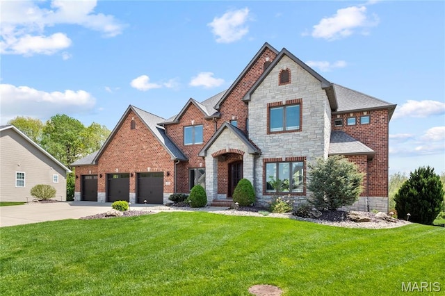 view of front facade featuring stone siding, driveway, a front lawn, and brick siding
