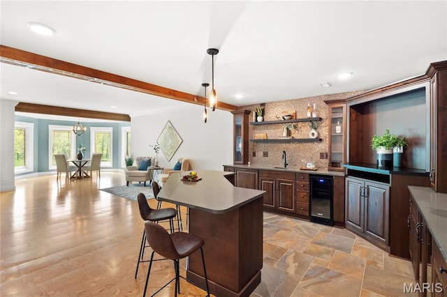 indoor wet bar with beverage cooler, decorative light fixtures, decorative backsplash, beamed ceiling, and recessed lighting