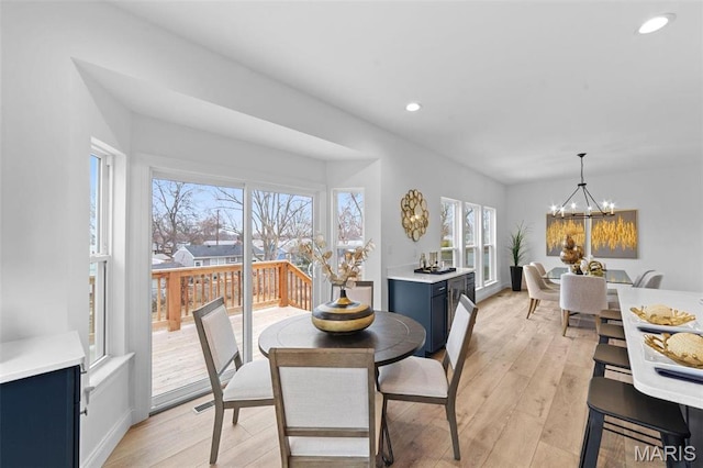 119 Monica Dr, Sunset Hills, MO 63127 - dining area featuring plenty of natural light, a chandelier, light wood-style floors, recessed lighting, and baseboards