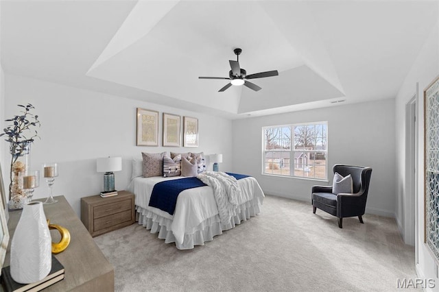 119 Monica Dr, Sunset Hills, MO 63127 - bedroom featuring a raised ceiling, light carpet, ceiling fan, and baseboards