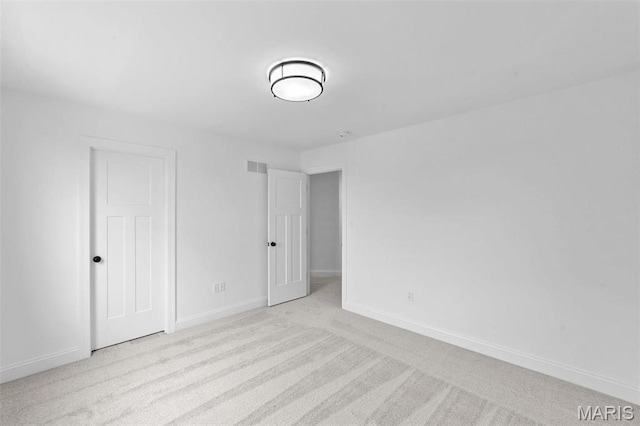 119 Monica Dr, Sunset Hills, MO 63127 - unfurnished bedroom featuring carpet flooring and baseboards