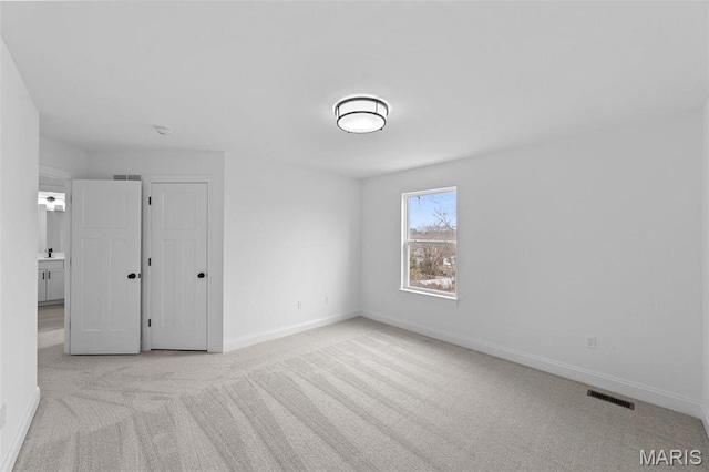 119 Monica Dr, Sunset Hills, MO 63127 - unfurnished bedroom featuring carpet floors and baseboards