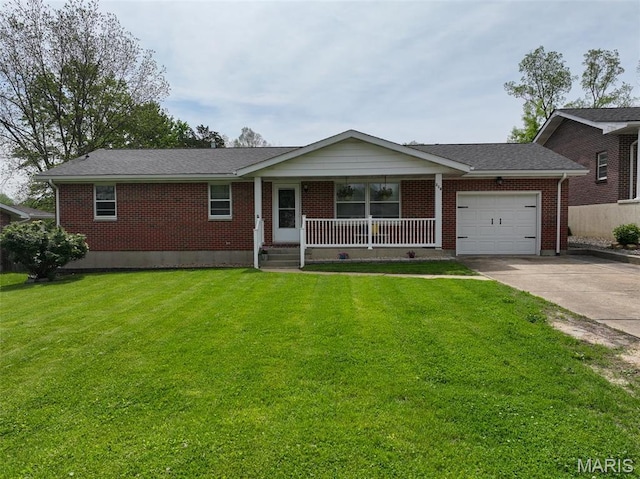 218 Riverview Dr, Saint Genevieve, MO 63670 - ranch-style home featuring an attached garage, driveway, covered porch, brick siding, and a front lawn