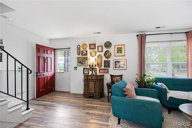 839 Dumont Pl, Saint Louis, MO 63125 - entrance foyer featuring stairs, wood finished floors, and baseboards