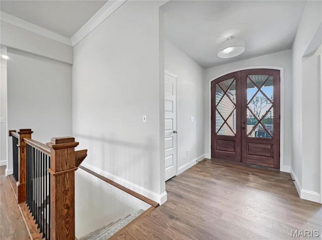 130 Stone Canyon Blvd, Foristell, MO 63348 - foyer featuring wood finished floors, baseboards, and ornamental molding