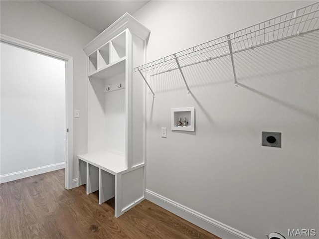 130 Stone Canyon Blvd, Foristell, MO 63348 - laundry room with hookup for an electric dryer, washer hookup, dark wood-style flooring, and baseboards