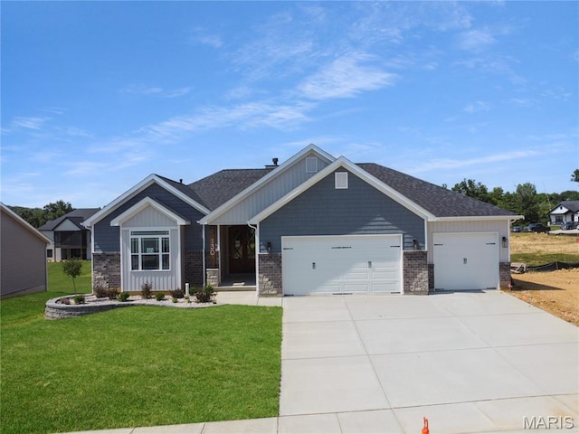 130 Stone Canyon Blvd, Foristell, MO 63348 - craftsman inspired home featuring a garage, a front yard, concrete driveway, brick siding, and board and batten siding