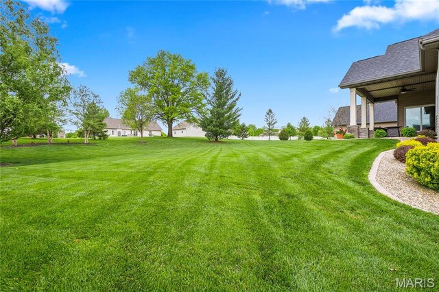 132 Hillary Cir, Wentzville, MO 63385 - view of grassy yard featuring ceiling fan