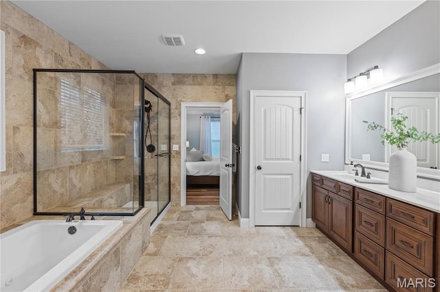 132 Hillary Cir, Wentzville, MO 63385 - bathroom featuring vanity, a shower stall, a bath, and ensuite bathroom