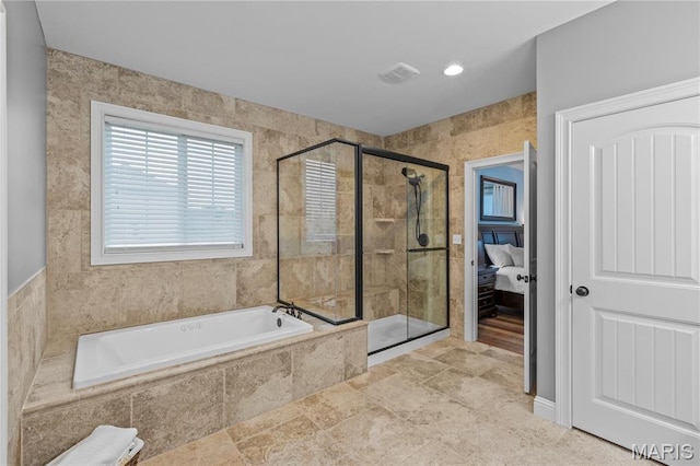 132 Hillary Cir, Wentzville, MO 63385 - ensuite bathroom with a shower stall and a bath