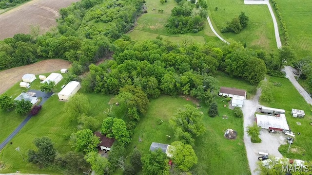 aerial view of property and surrounding area featuring rural landscape