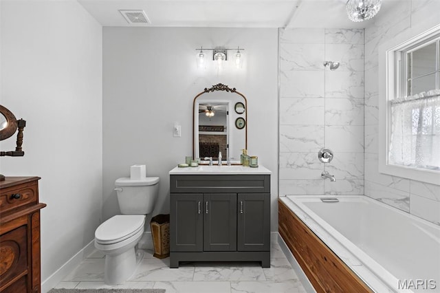full bathroom with marble look tile flooring, vanity, toilet, a ceiling fan, and shower / tub combination