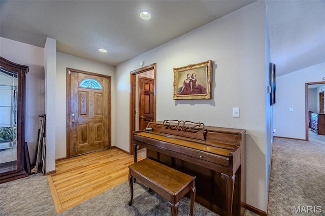 23598 Falcon Rd, Lebanon, MO 65536 - entryway with light colored carpet, baseboards, and recessed lighting