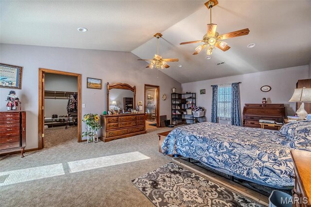 23598 Falcon Rd, Lebanon, MO 65536 - carpeted bedroom with vaulted ceiling, a spacious closet, and a ceiling fan